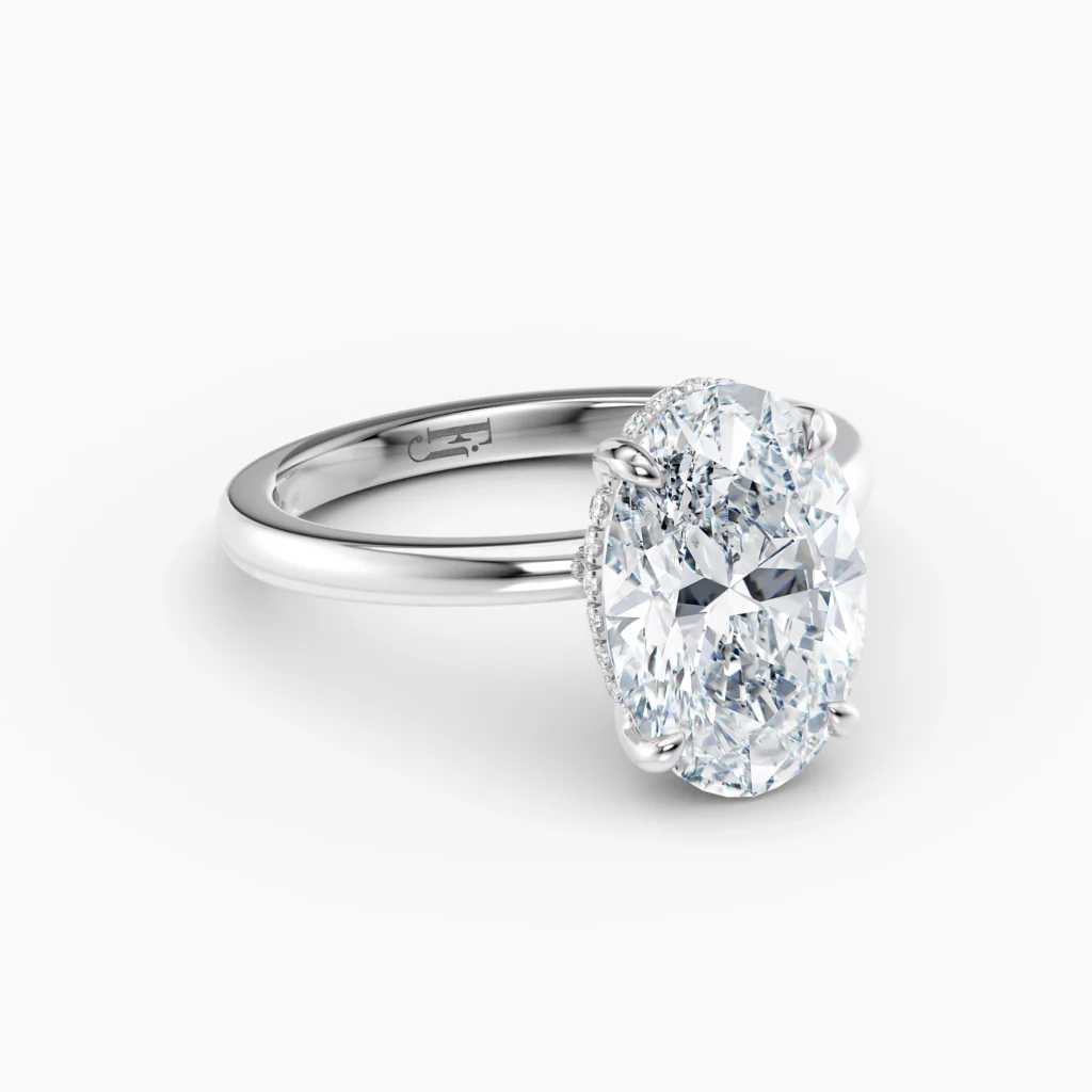 Oval Diamond Set In Platinum Engagement Ring Front Side View